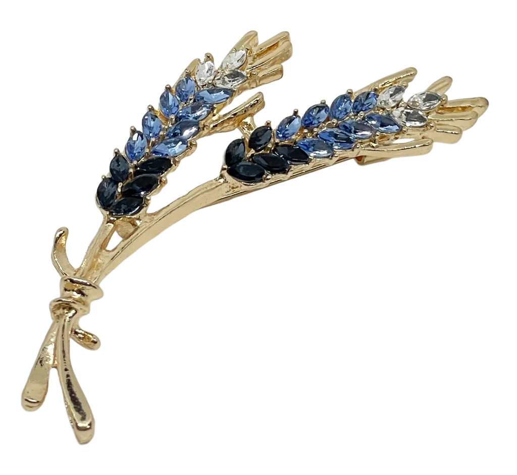 Prendedor dorado con azul y brillantitos