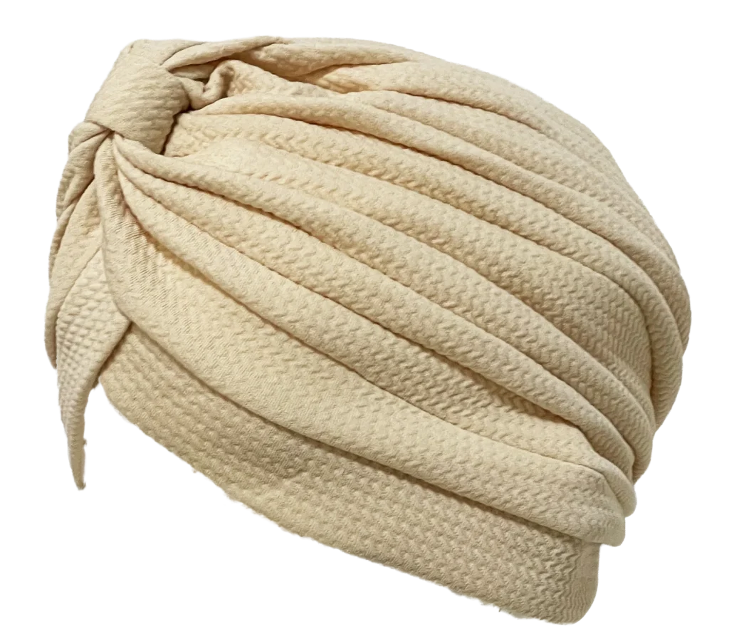 Turbante beige con diseño