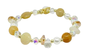 Pulsera elástica de vidrio beige con dije cola de sirena-gallery-0