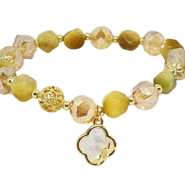 Pulsera elástica de vidrio con dije de trébol