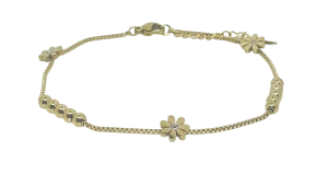 Tobillera de acero con dijes de flores