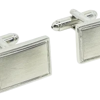 Mancuernillas plateadas de metal
