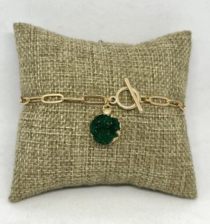 Pulsera dorada con piedra verde