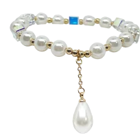 Pulsera dorada de rodio elástica con perlas