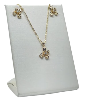 Set collar y aretes dorado de rodio con dije de flor
